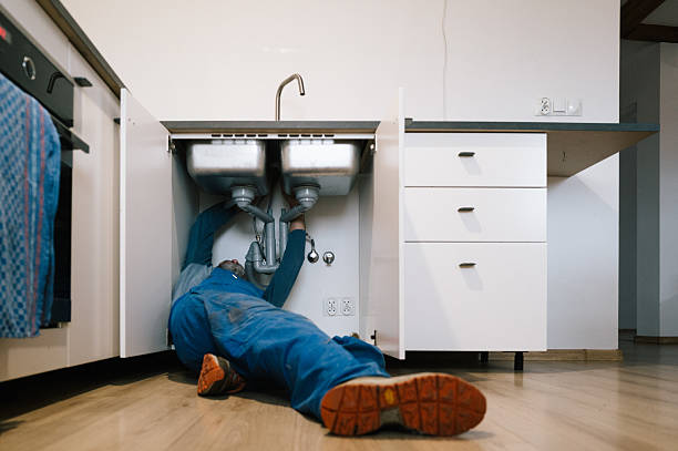 Professional Drain Cleaning technician working in Lake City, FL